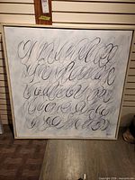 Front view of framed abstract painting