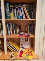 Full bookcase view showing quantity and variety of books and study guides