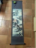 Full view of mounted hanging scroll from top mount to lower roller showing complete artwork and scale tape