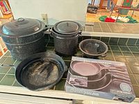 Group shot of all cookware items on counter