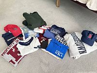 Group shot of all clothing, caps, accessories laid out
