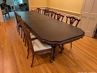Full view of extended table with twelve chairs