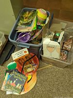 Overview of tote with Easter eggs, baskets, books, cardboard decorations