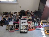 Full layout of over 30 pairs assorted women’s shoes