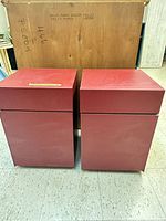 Front view of both red nightstands side by side
