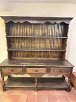 Full front view showing shelves, drawers, lower shelf