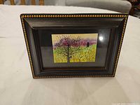 Front view of framed artwork