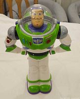 Front view of Buzz Lightyear figure showing suit details and clear helmet