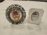 Both picture frames side by side showcasing size and style