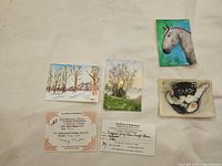 Group shot of 4 ACEO art cards plus 2 COAs