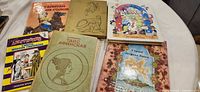 All six Russian hardcover books laid out