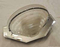 Front angled view showing frosted glass bowl, chrome ring and mirrored backplate