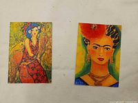 Front view of both postcard prints showing artwork details