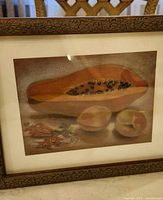 Full view of framed still life fruit print showing ornate gold-tone frame and artwork
