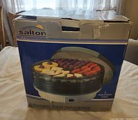 Front of original Salton box showing dehydrator image and brand