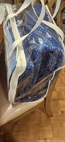 Bagged blue bubble wrap on table