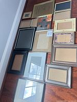 Top-down view showing all fourteen frames various sizes and finishes