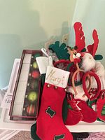 Group showing stockings, headbands, boxed ornaments