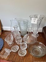 Group shot showing all glass and crystal pieces together on floor