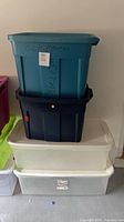 Stack showing teal, navy, off-white, clear totes plus lime and magenta totes at side
