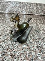 Front view showing bronze horse and scoop