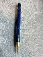 Full view of pen showing body color and metal tip