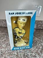 Front view of boxed Mike Ricci bobblehead
