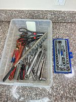 Overview of tub with mixed tools and separate socket case