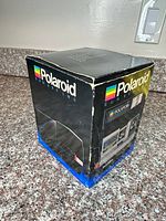 Original Polaroid Sun 600 LMS retail box showing branding and model