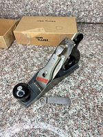 Overall view of Stanley Handyman bench plane, wrench and box