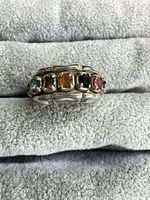 Front view of sterling ring showing five colored stones