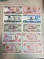 Overview of ten Vietnamese banknotes laid out in five rows