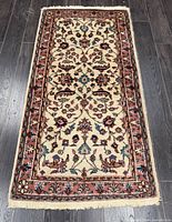 Full view of handmade wool rug showing overall design and dimensions