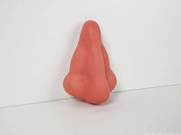 front view of flesh-tone silicone nose dispenser