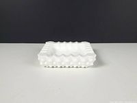 Top view of square white hobnail milk glass ashtray