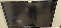 Front view of Sharp Aquos TV powered off