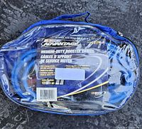 Front view of sealed Nascar Advantage booster cable set showing brand, specs, and blue carry case