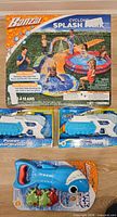 Boxed Banzai Cyclonic Splash Park, two Aqua water blasters, Shark Chomp set visible