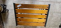 Top view showing five wood slats and metal frame edges