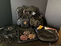 Group shot of all seven black bags