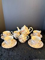 Full 13-piece tea set displayed