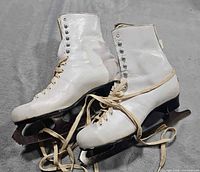 Full view of both skates showing uppers and lacing