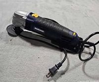Side view of Mastercraft oscillating multi-tool with cord and cutting disc
