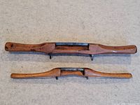 Front view of both boxwood spokeshaves showing blades and handles