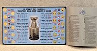 Full view of board with coins and leaflet