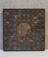 Full front view showing entire engraved copper block on oak backing