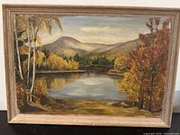 Frontal view of framed oil painting