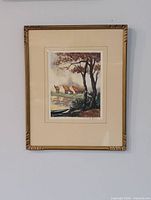 full view of framed etching on wall