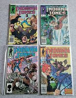 Group shot of four bagged Indiana Jones comics