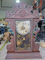 Full front view of Sessions carved wood gingerbread mantel clock showing overall design and proportions
